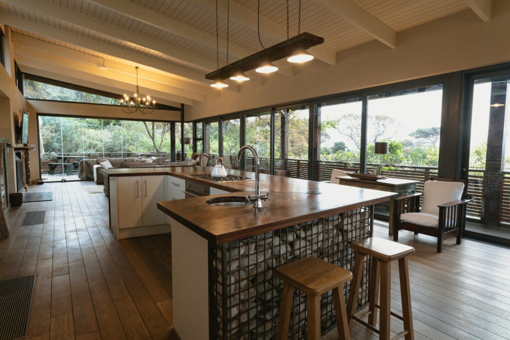 How Clutter Affects Feng Shui and Mental Well-Being 8 Interior of open plan kitchen diner and living room of comfortable home, with windows to terrace